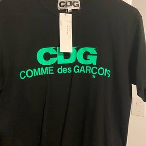 New CDG size M
